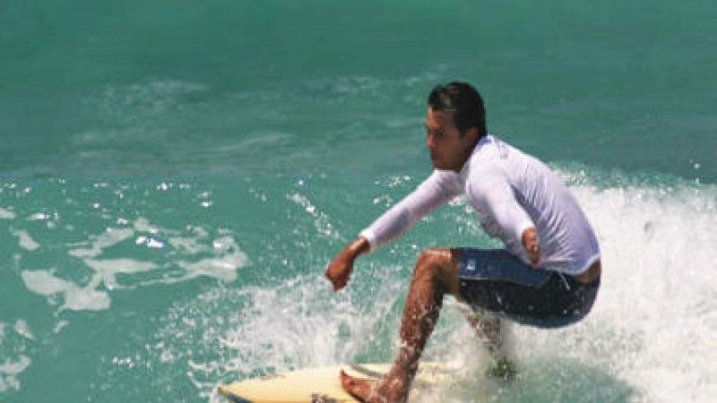 Guido Schäffer, o anjo surfista (Reprodução) Guido Schäffer, o anjo surfista (Reprodução)