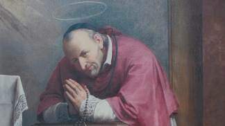 Santo Afonso rezando
