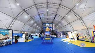 Supertenda com estantes montada no Santuário na Romaria dos Devotos em 2026 